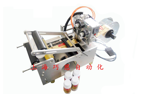 半自動圓瓶貼標機
